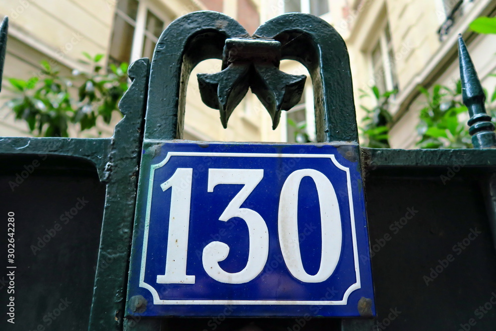 Numéro 130. Plaque de nom de rue. Paris. Stock Photo | Adobe Stock