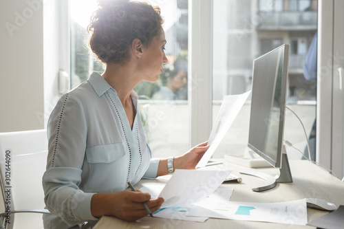 Businesswoman Working in an Office photo