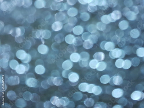 blue blurred bokeh of light for abstract background 