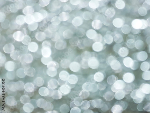 gray blurred bokeh of light for abstract background 
