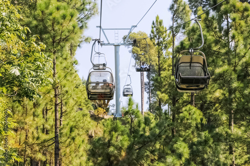 Lush Green Pine Trees Forest Landscape and Patriata Chairlift, New Murree, Punjab, Pakistan photo