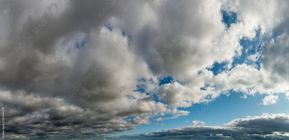 Fantastic clouds against blue sky, panorama Fantastic clouds against blue sky, panorama