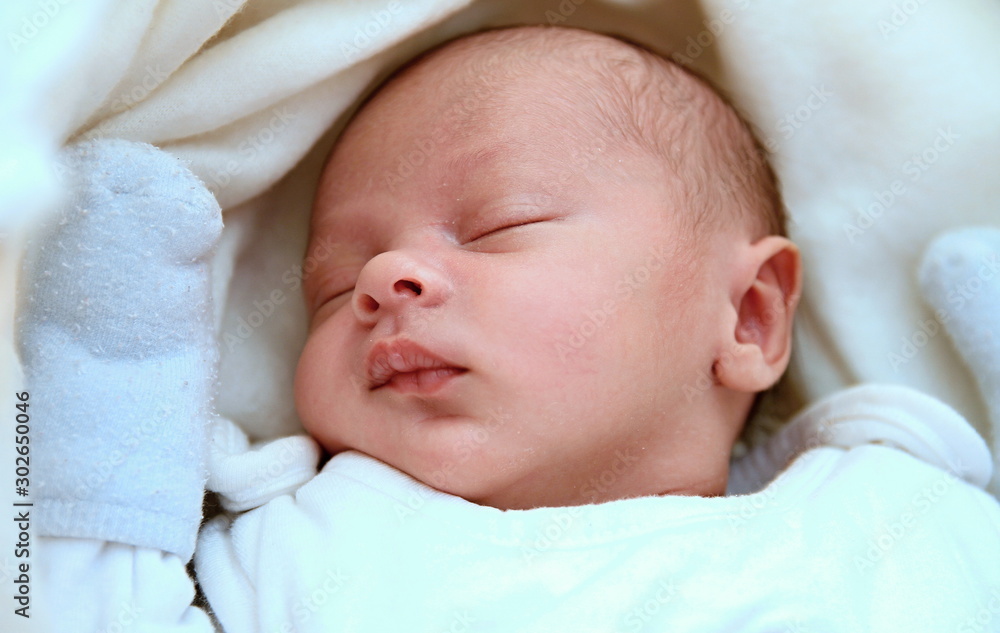 baby sleeping wrapped up in blanket just been cared for after having a good sleep in bed stock photograph stock photo baby sleeping wrapped up in blanket just been cared for after having a good sleep in bed stock photograph stock photo