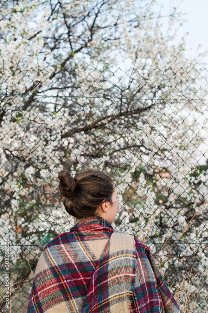 portrait of young woman in spring garden portrait of young woman in spring garden