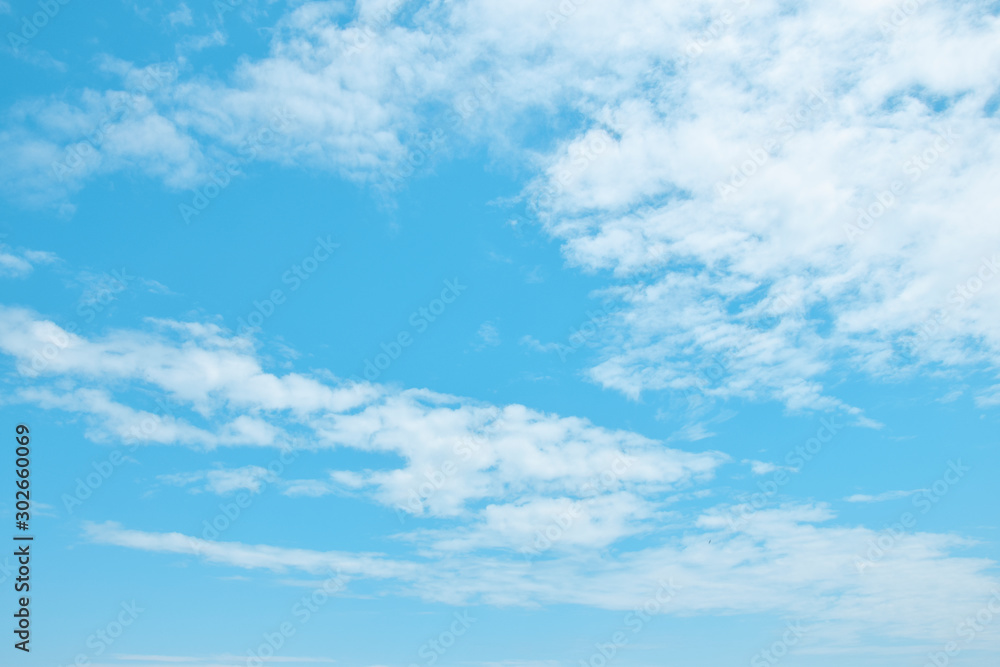 Beautiful blue sky with white air clouds