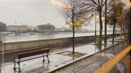 View of Danube river from tram window on a rainy day in Budapest, Hungary
