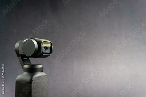 Photography KUALA LUMPUR, MALAYSIA - November 13, 2019 : DJI Osmo Pocket stabilized handheld camera close up on black background
