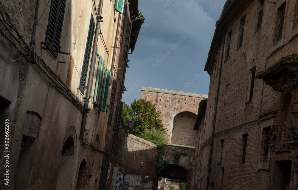 Siena Italy. City wall gate Tuscany