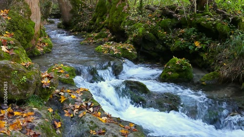 tranquil mountain river stream in forest urach schwäbische alb germany photo