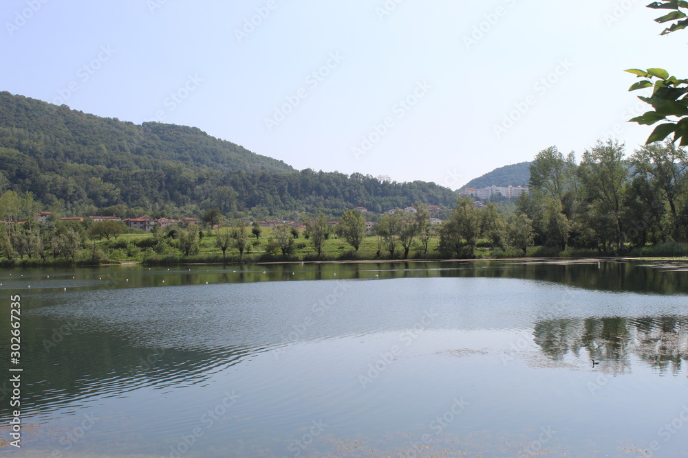 Mountain view by Revine lake (landscape,sky,nature,blue,river,panorama,travel,reflection) Mountain view by Revine lake (landscape,sky,nature,blue,river,panorama,travel,reflection)