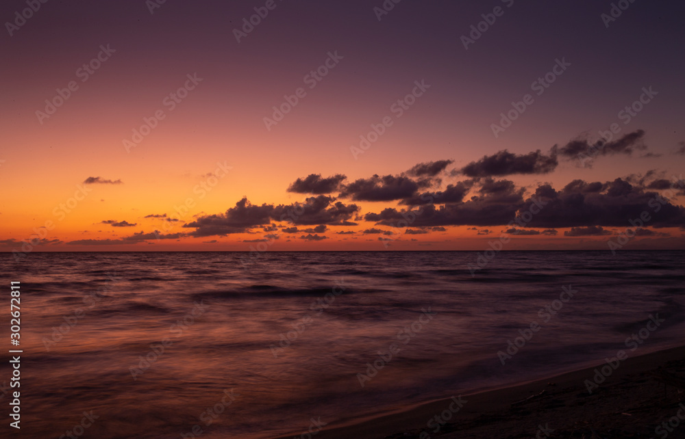 Castel Volturno. Sunset at the coast. Sea.. Campania Italy. Coast. Mediterranean Castel Volturno. Sunset at the coast. Sea.. Campania Italy. Coast. Mediterranean