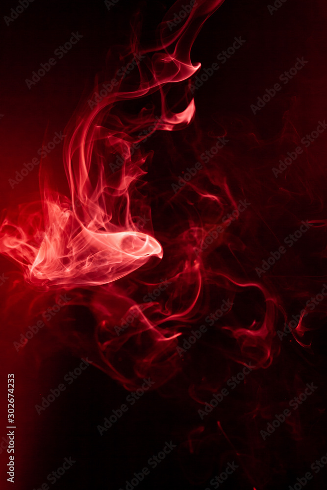 Red smoke motion on black background. Red smoke motion on black background.