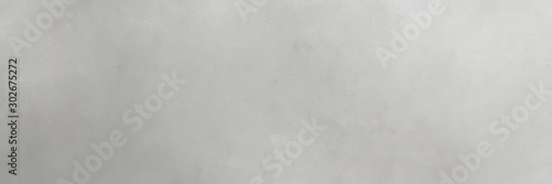 old color brushed vintage texture with silver, dark gray and light gray colors. distressed old textured background with space for text or image. can be used as header or banner