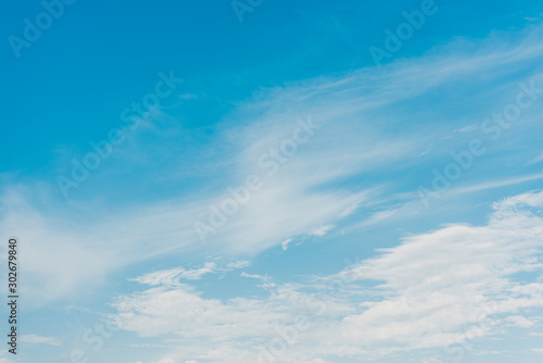 white clouds on blue sky with copy space