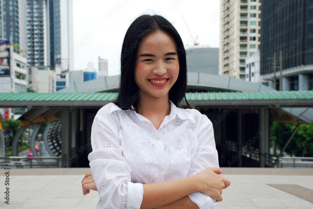 Beautiful business woman smile portrait and relaxation on walking street at outdoor. Beautiful business woman smile portrait and relaxation on walking street at outdoor.
