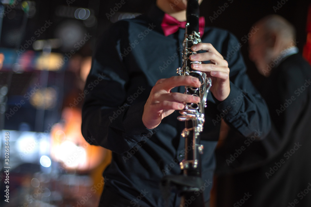 Fototapeta premium woman playing flute