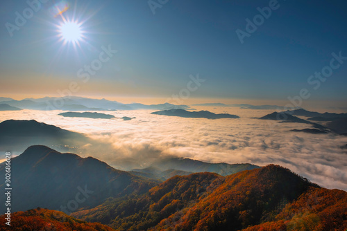 The horizon line is normally covered with morning mist in autumn on the peak of Chunmasan Mountain in Seoul  South Korea.