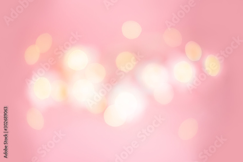 Blurry shining golden christmas lights. Magical; fabulous and festive concept. Abstract texture background with bokeh effect. Merry Christmas and Happy Holidays banner and greeting card.
