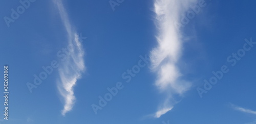 white clouds in the blue sky