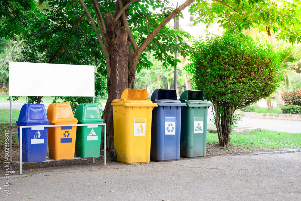 Colorful trash in the park Garbage trash bins for waste segregation