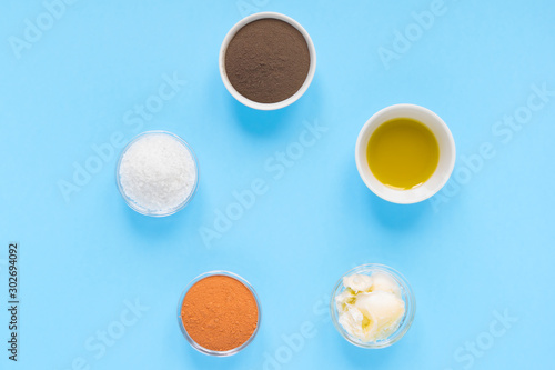 circular composition from spa set natural products for self-care at home on turquoise background. flat lay, top view