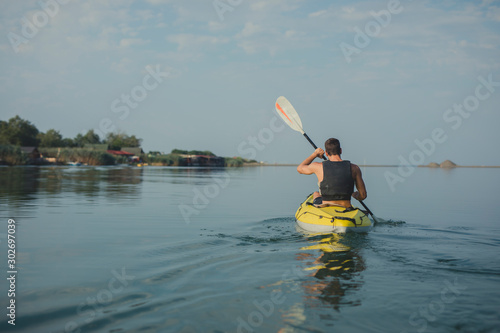 Wallpaper Mural Handsome Young Man Kayaking Torontodigital.ca