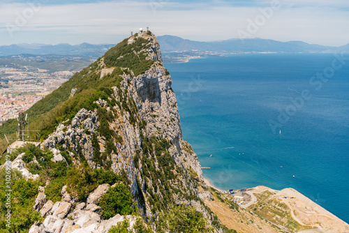 landscape, beautiful cliff covered with greenery, over the ocean