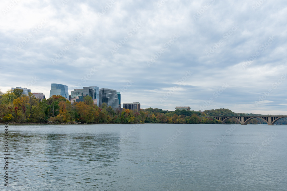 Rosslyn Virginia Skyline with a Bridge and the Potomac River seen from Georgetown in Washington D.C.