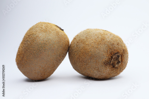 juicy kiwi on a white background. funny smiley with fruits