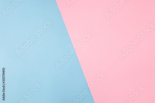 Photo of shared divided into two parts background harmonically soft pastel colored empty space for filling text idea banner billboard pink and blue colors