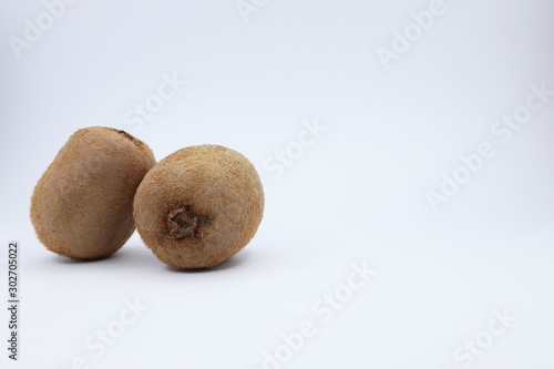 juicy kiwi on a white background. funny smiley with fruits