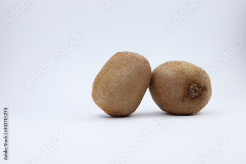 juicy kiwi on a white background. funny smiley with fruits