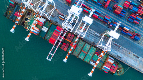 Photography Container ship carrying container for business freight shipping import and export, Aerial view container ship arriving in commercial port