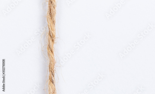 Rope, thread closeup on a white background with empty place for text.