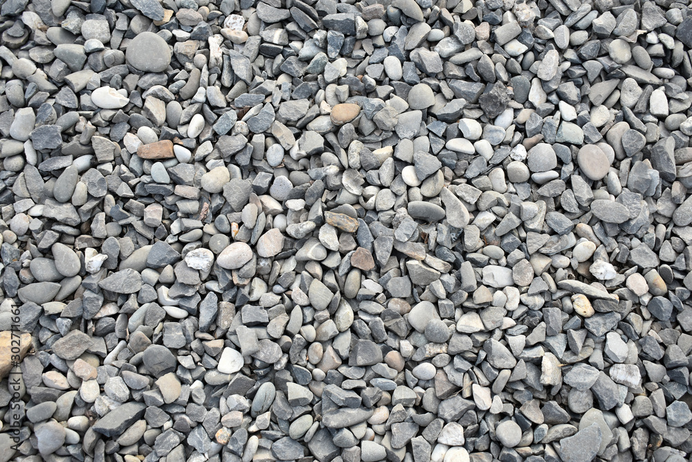 Gravel background with small and medium size stones various colors Gravel background with small and medium size stones various colors