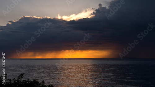 Dramatic sunset over water