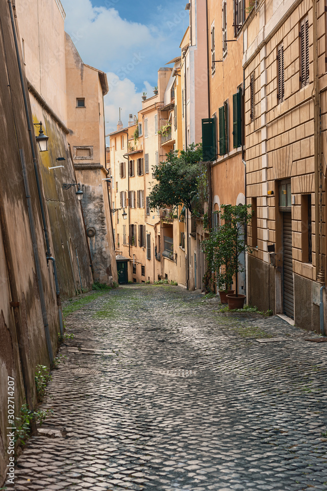 Rome, Italy - October 13, 2019 - one of the many narrow streets of the old Roman district of Trastevere