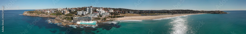 Aerial panoramic view of Bondi Beach pools and coastline on a beautiful winter day