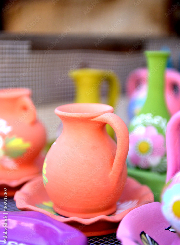 handmade pottery vessel on a market,