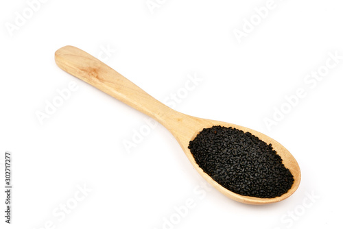 Lemon basil seeds in wooden spoon isolated on white background.food for help Reduce Cholesterol Levels For those who need to control weight