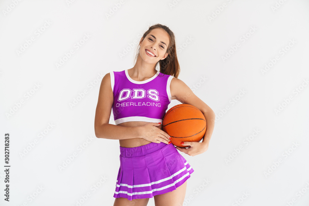 Cheerleader woman isolated over white wall