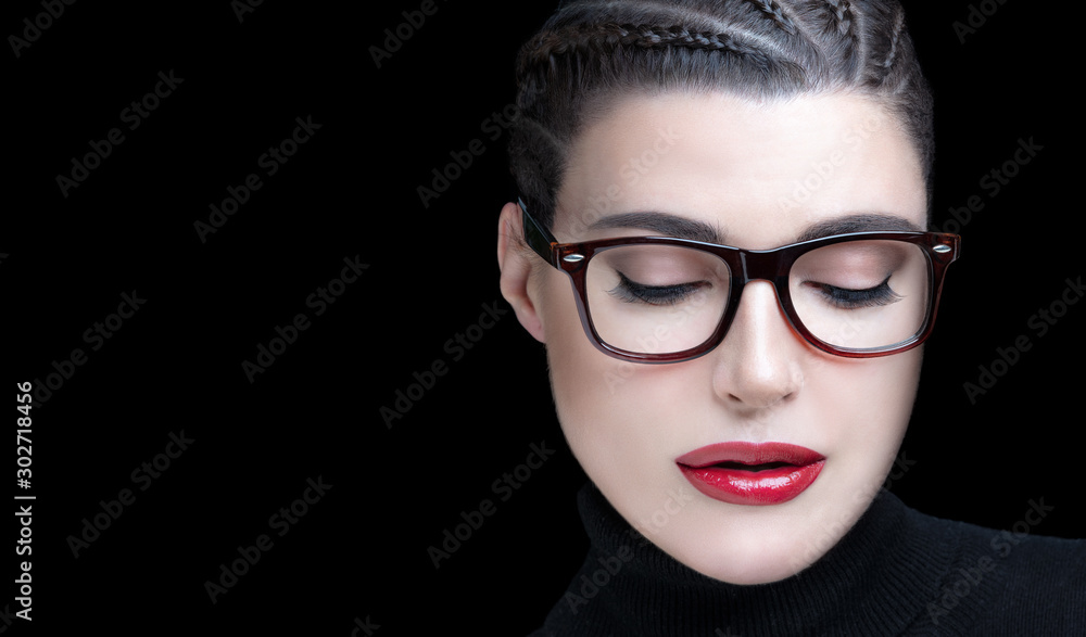 Stylish woman in trendy glasses and perfect makeup Stylish woman in trendy glasses and perfect makeup