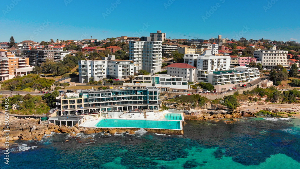 Amazing aerial view of Bondi Beach landscape in Sydney, Australia. Drone viewpoint on a sunny morning