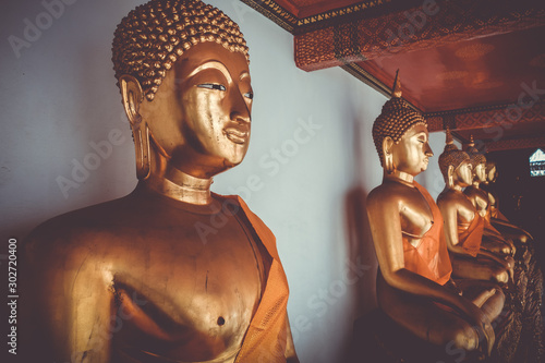 Buddha statues in Wat Pho, Bangkok, Thailand photo