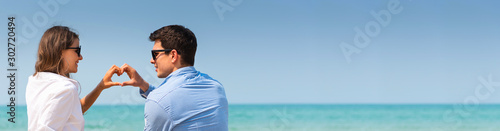 young couple in love on the beach