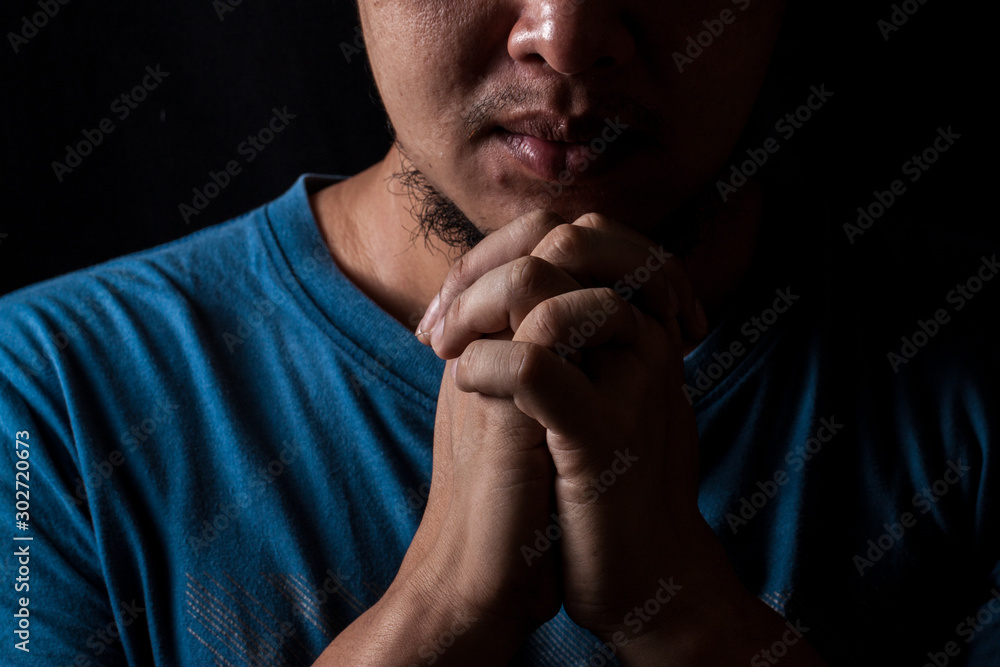 Man pray with hand, the Spiritual belief in God believe in great spirit Man pray with hand, the Spiritual belief in God believe in great spirit