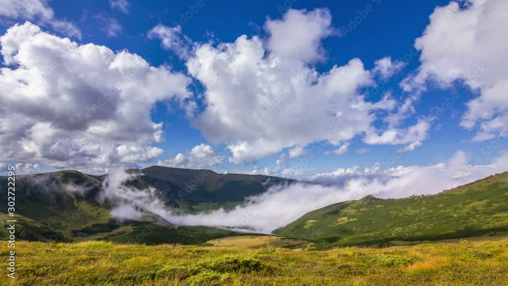 Timelapse of beautiful summer landscape in mountains with clouds passing by Timelapse of beautiful summer landscape in mountains with clouds passing by