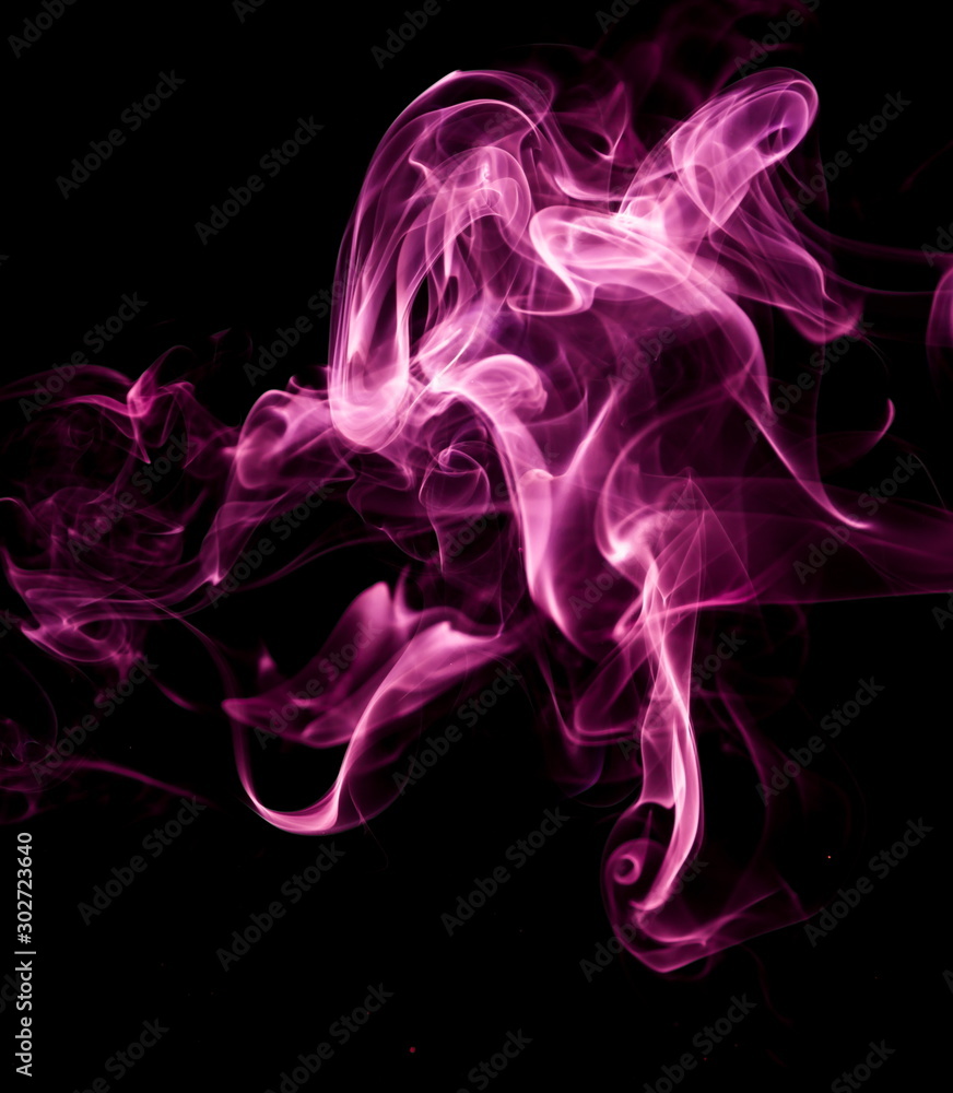 Purple smoke on black background