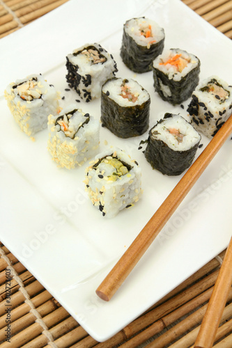several makis on a plate