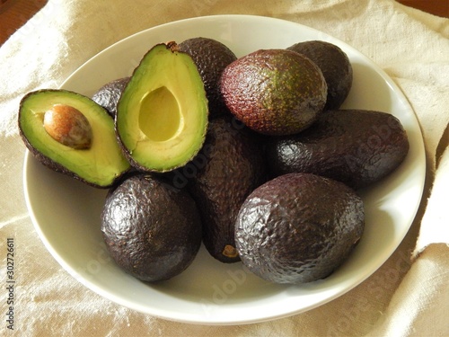 Obraz na plátne Ripe brown avocados as a high-calorie  source of vitamins, L - carnitine and mon